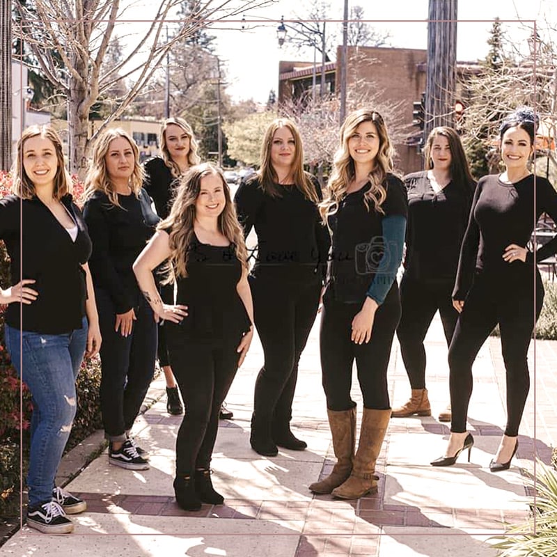 a group of people posing for a photo